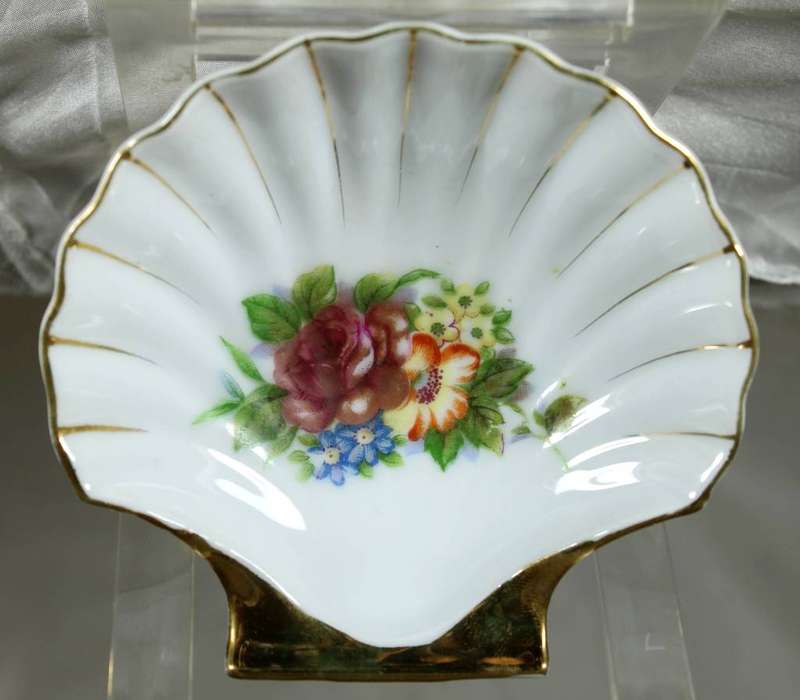 Small white shell trinket bowl with painted flowers