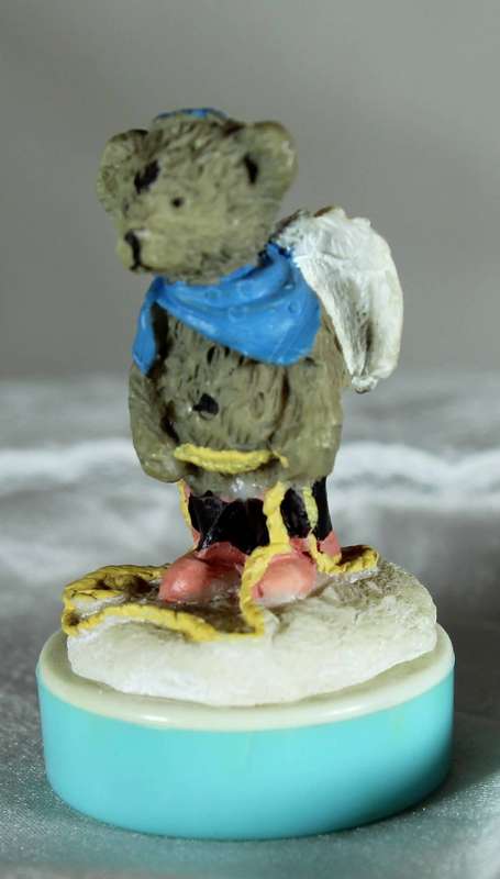 Miniature plastic angel bear boy