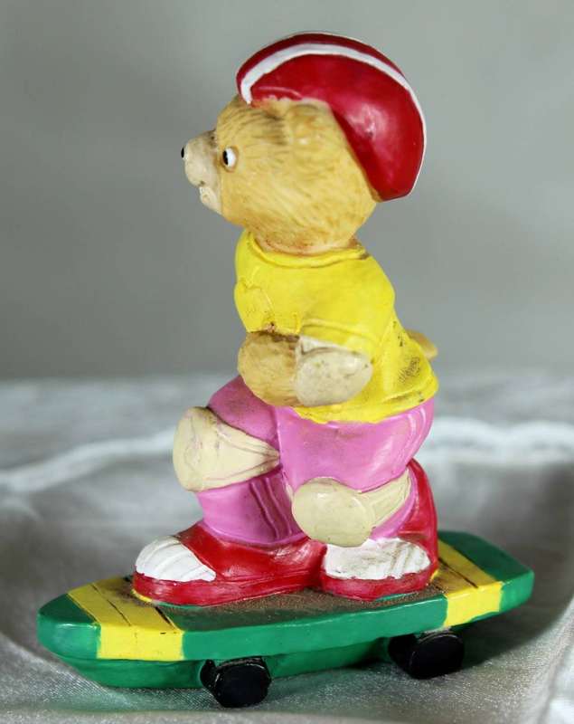 Bear riding a skateboard