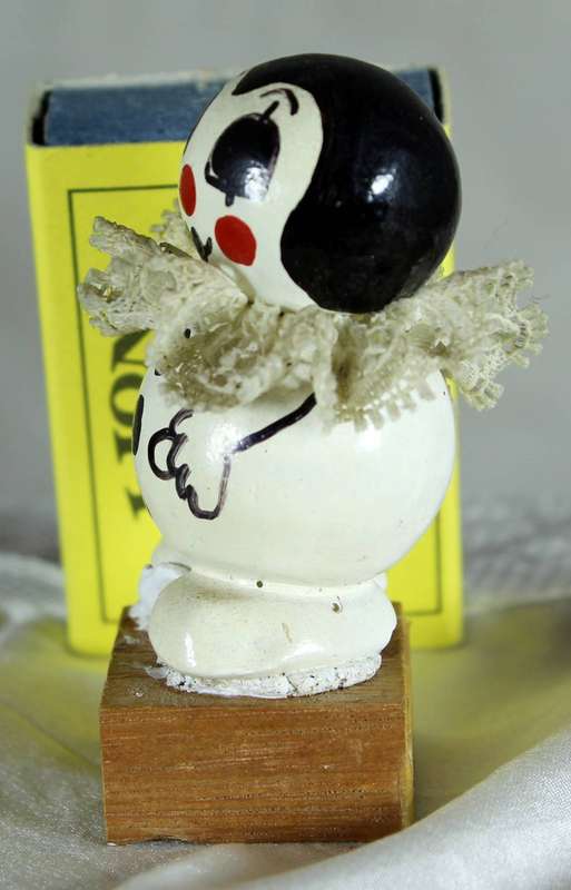 Vintage clown on a wood block