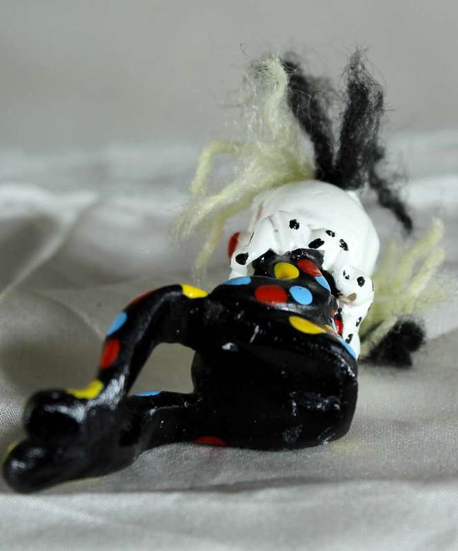 Sitting clown with legs hanging off