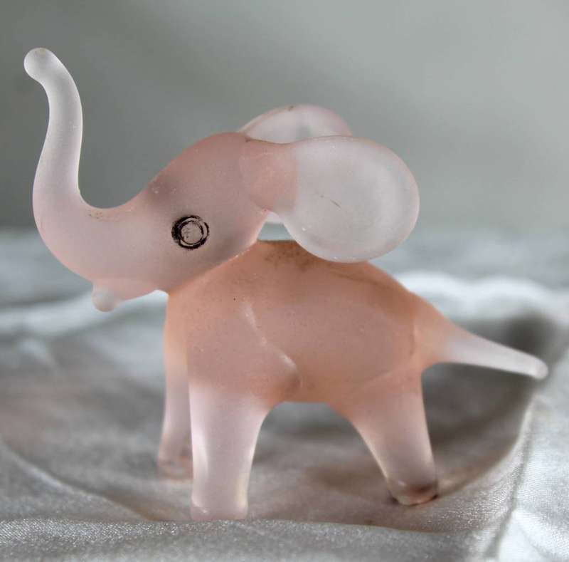 Miniature pink glass elephant