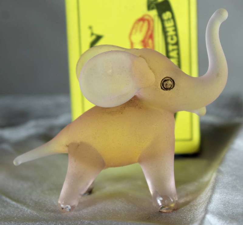 Miniature pink glass elephant