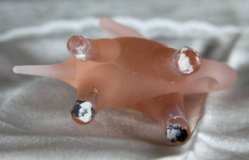Miniature pink glass elephant