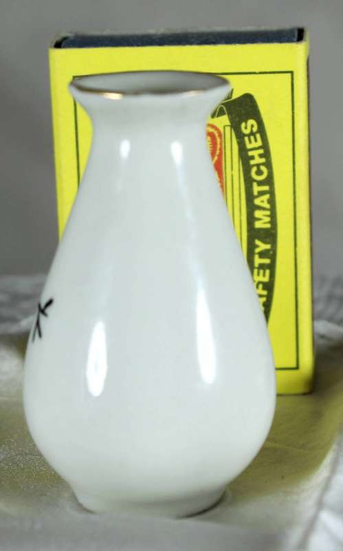 Miniature white bud vase with black motif & golden gilding