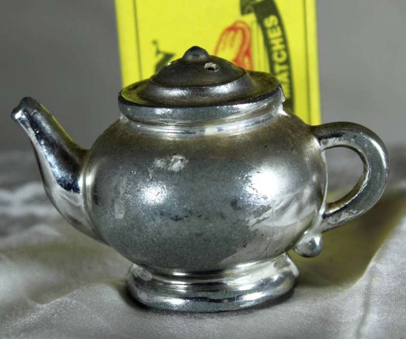 Miniature metal teapot