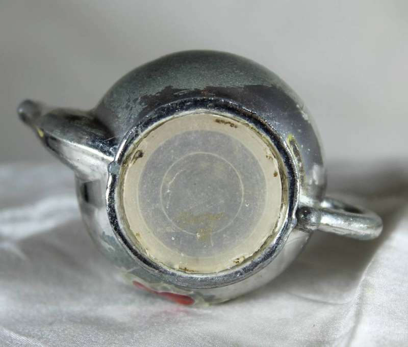 Miniature metal teapot