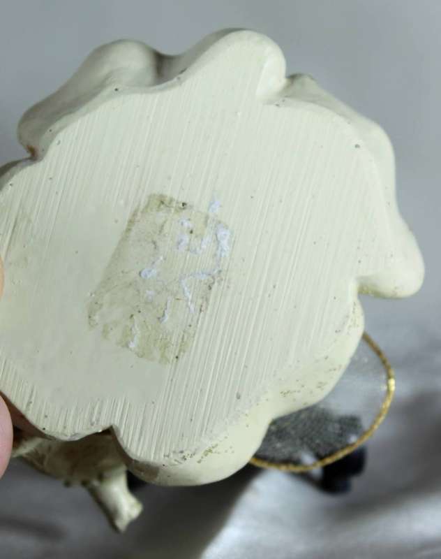 Vintage ceramic Tinkerbell figurine with flower wings