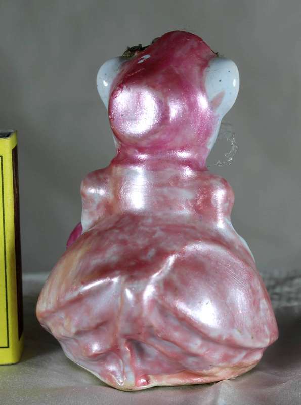 Googly eyed mouse in pink dress