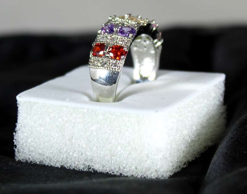 Costume jewellery - five coloured emerald look ring