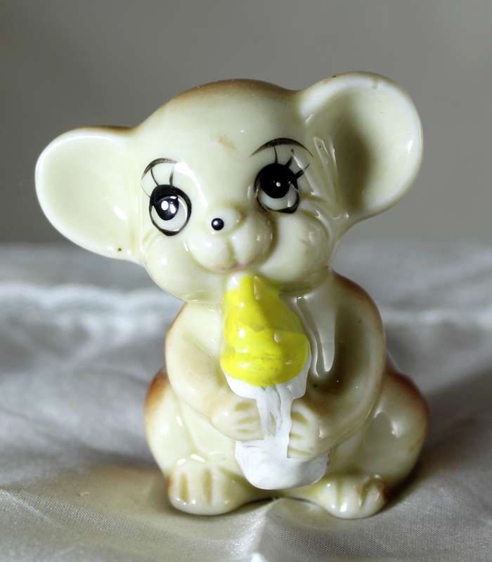 Vintage porcelain mouse with bottle