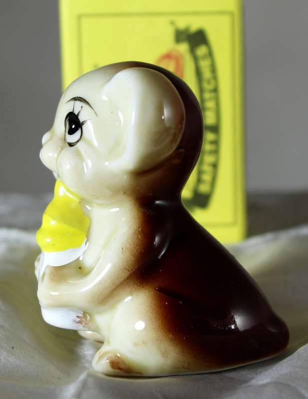 Vintage porcelain mouse with bottle