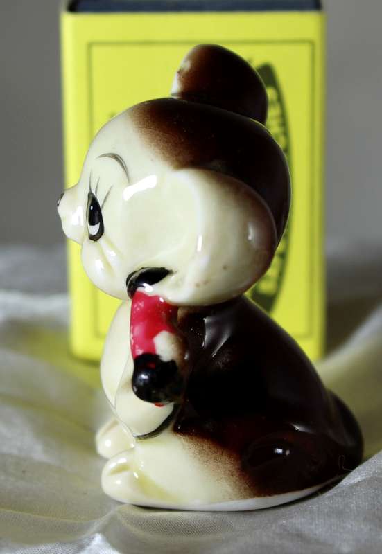 Vintage porcelain mouse lifting weights