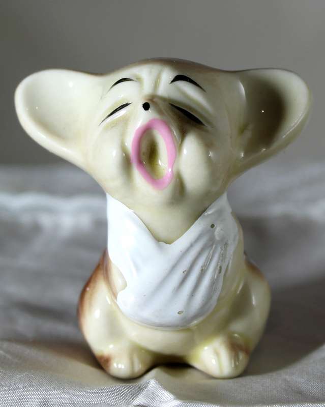 Vintage porcelain baby mouse crying