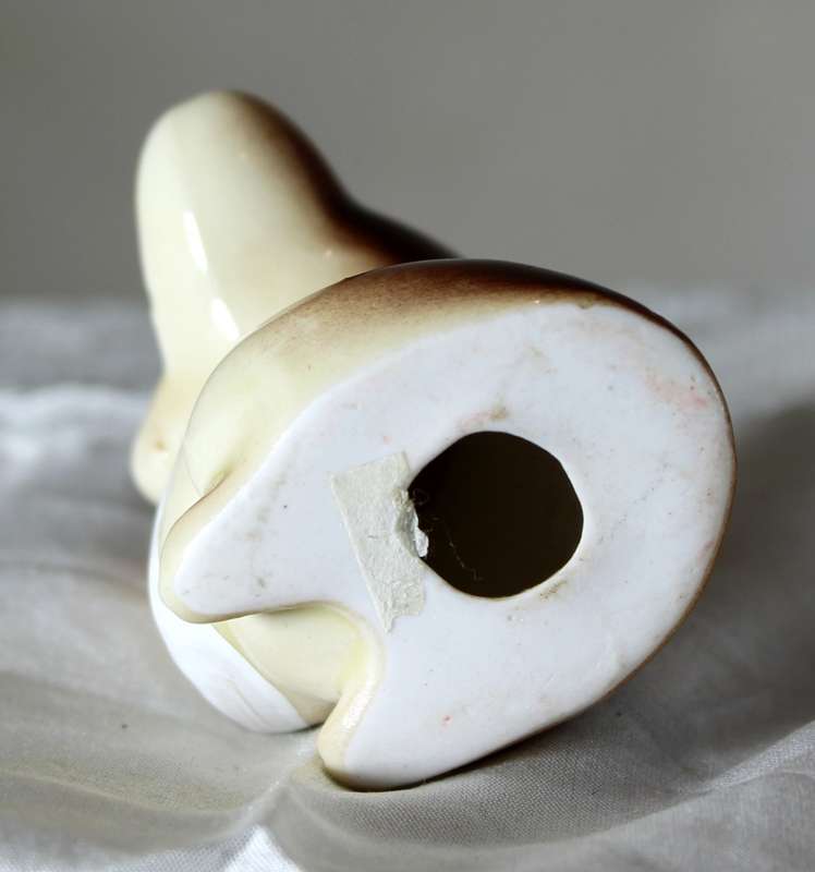 Vintage porcelain baby mouse crying