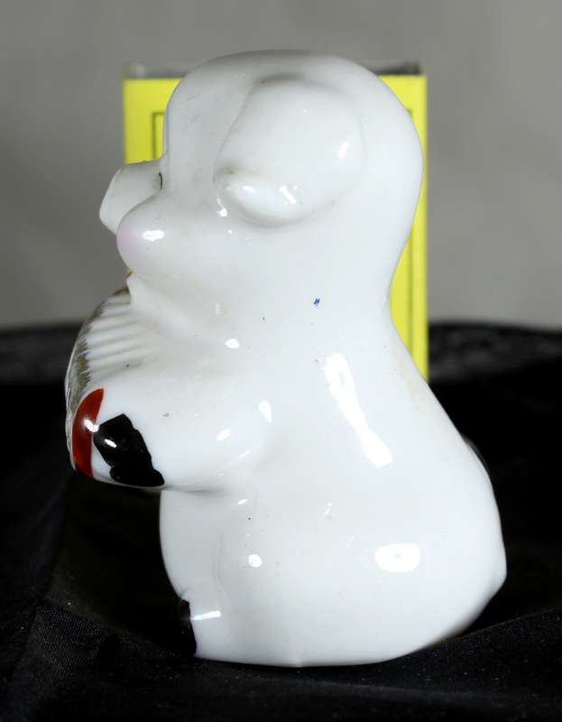 Vintage porcelain miniature musician pig - playing the accordion