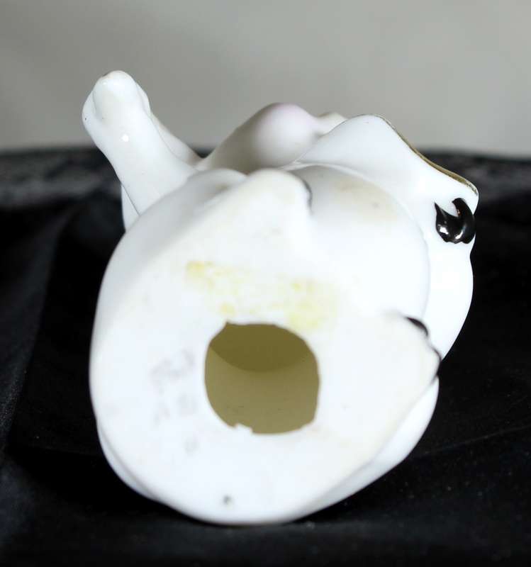 Vintage porcelain miniature musician pig - the conductor