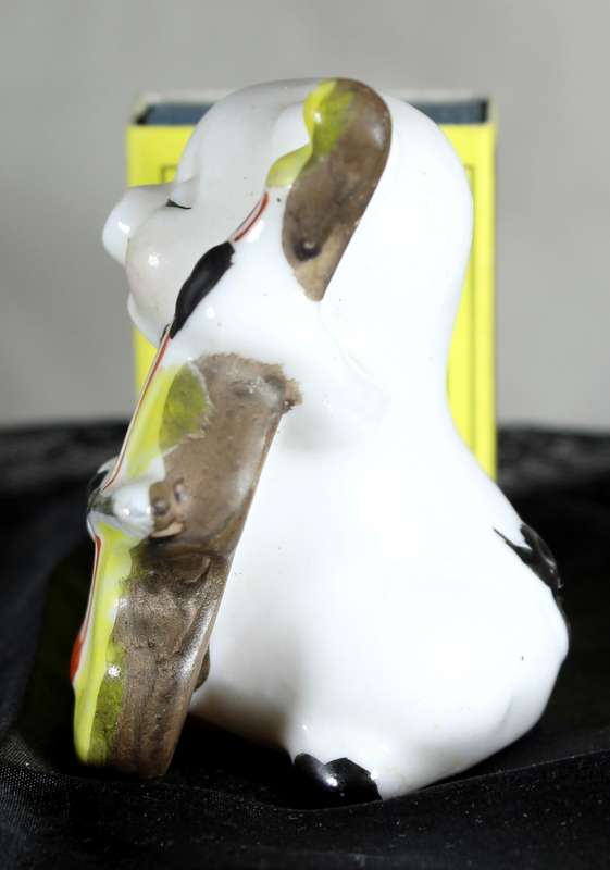 Vintage porcelain miniature musician pig - playing the cello