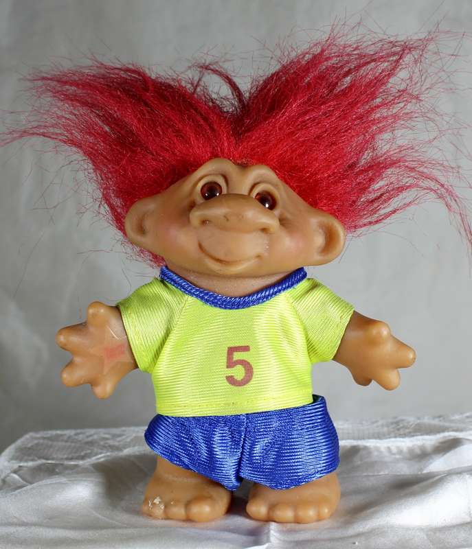 Vintage soccer troll with red hair - team work