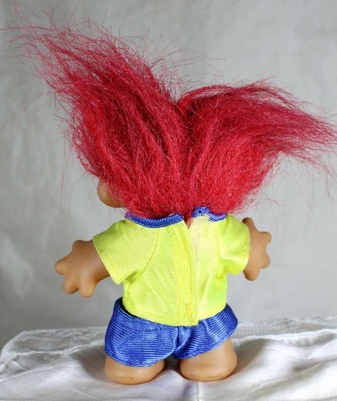 Vintage soccer troll with red hair - team work