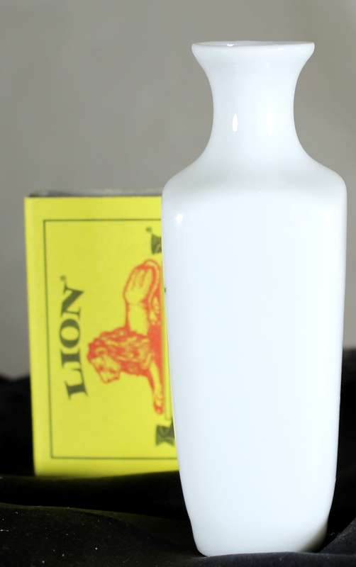Small Chinese glass bud vase