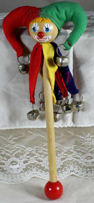 Clown with bells on stick