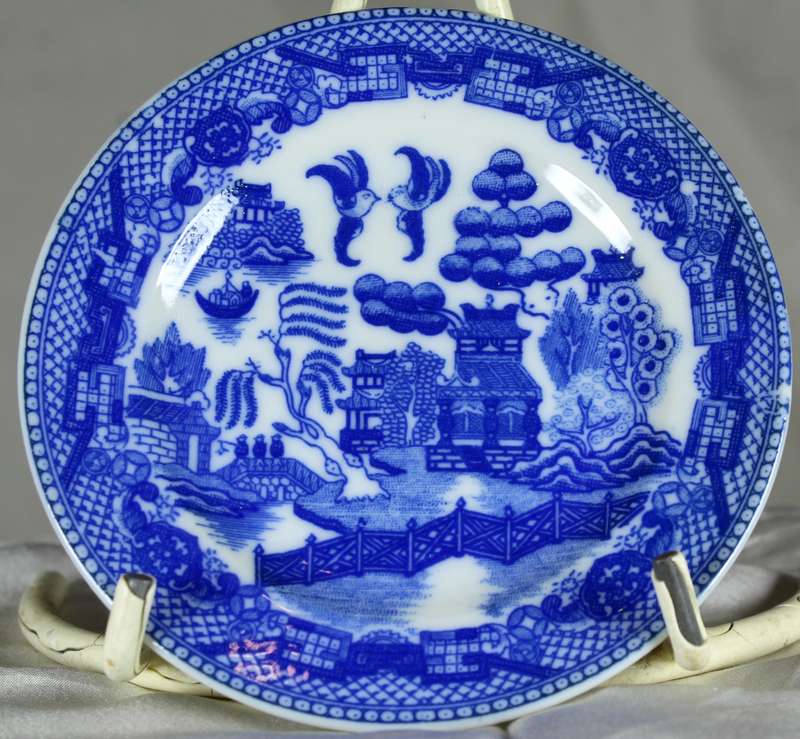 Small blue willow plate