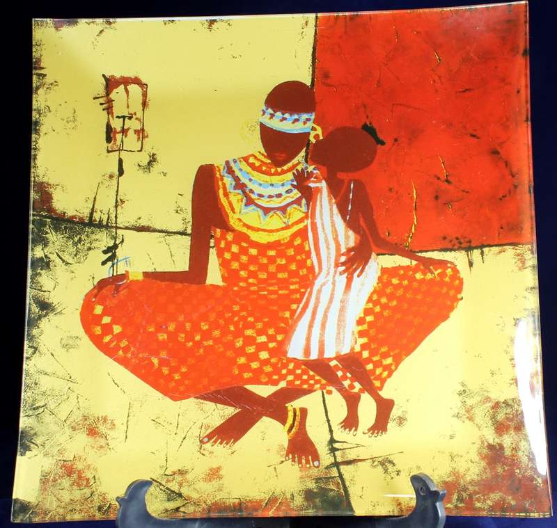 Large glass platter with mother & child scene