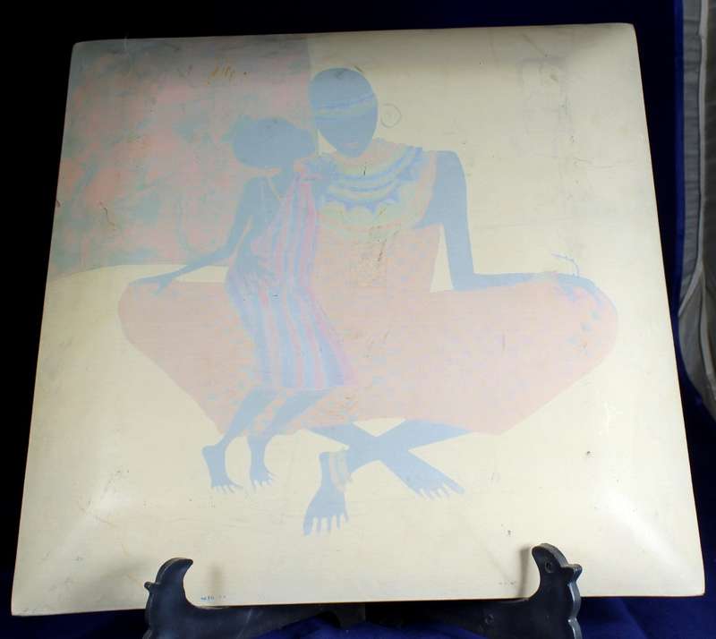 Large glass platter with mother & child scene