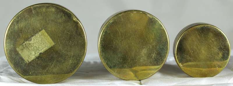 Graduated set of brass pill holders