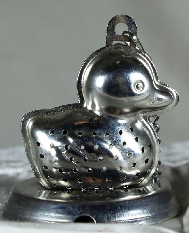 Tea duck caddy on a stand