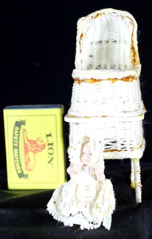 Vintage Miniature Wicker Basket with Baby