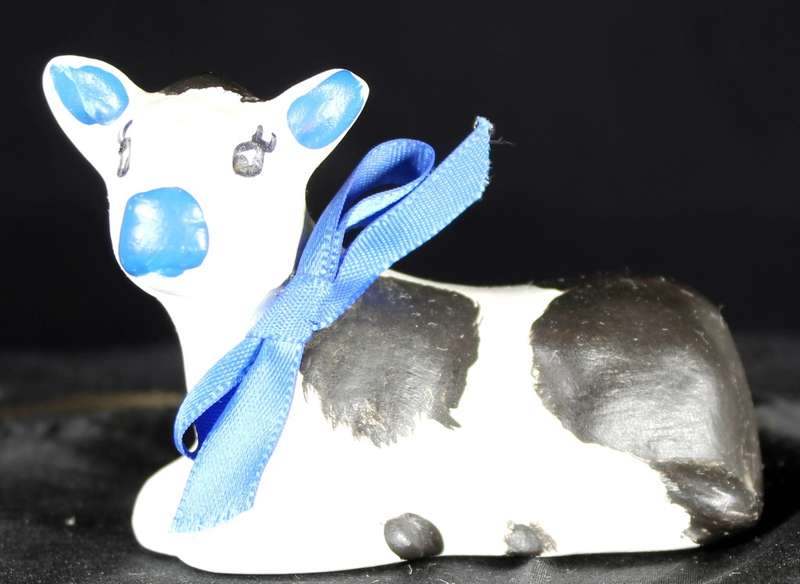 Small Ceramic Cow Laying Down