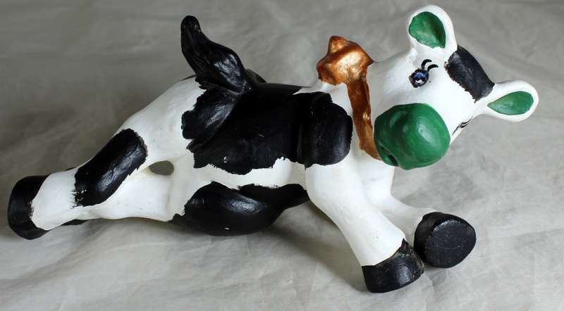 Ceramic Cow Sitting on a Fence - BID NOW!!!