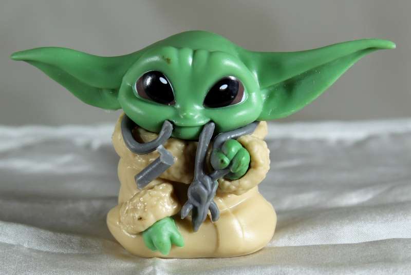 The Mandalorian - Grogu Holding Something
