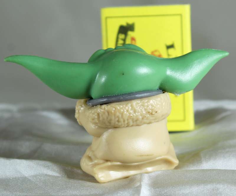 The Mandalorian - Grogu Holding Something