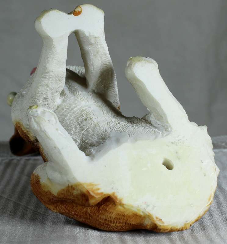 Saint Bernard Dog Sitting Down with Bone