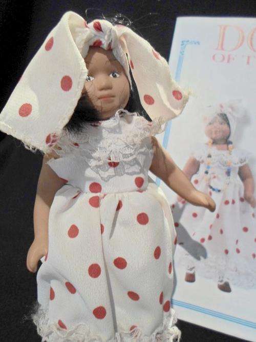 DOLLS of the World - Cuba - Genuine Porcelain Doll - Complete with stand and guide book!!