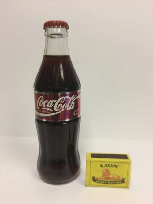 VINTAGE and RARE SEALD Commemorative Coca Cola bottle with foil label "thanking the seller"
