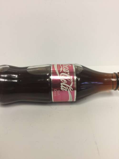 VINTAGE and RARE SEALD Commemorative Coca Cola bottle with foil label "thanking the seller"