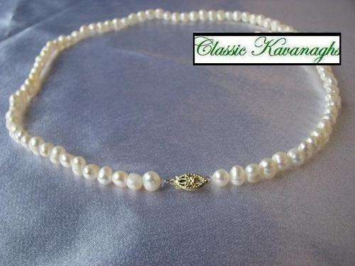 Solid 14K Gold clasp on a Exquisite White Fresh Water Pearl Necklace