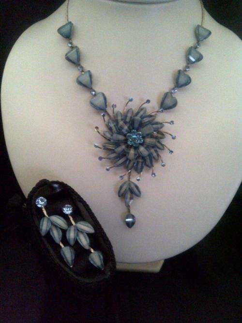 Bedazzled Blue coral flower Necklace & earing set . GORGEOUS