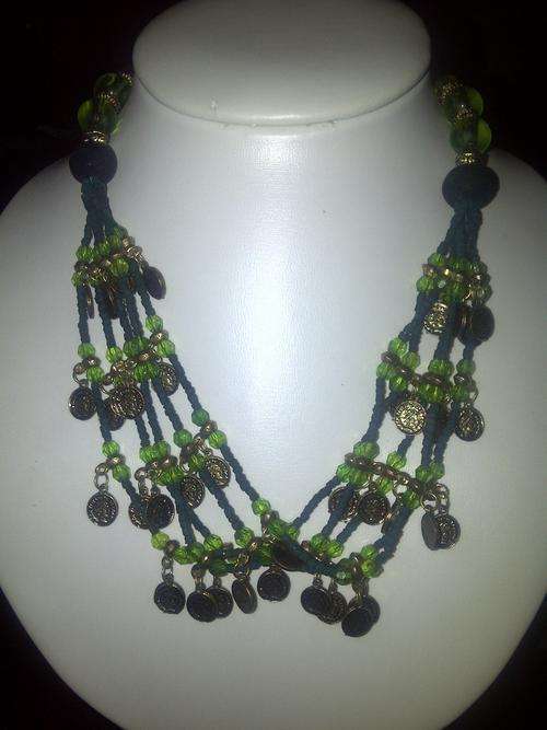 A lovely green 5 strand beaded Necklace. so cassic!! Jazz up your drab winter wardrobe!