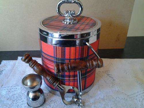 A lovely vintage look "Bar set", ice bucket with tot measure & other items. Really good buy!