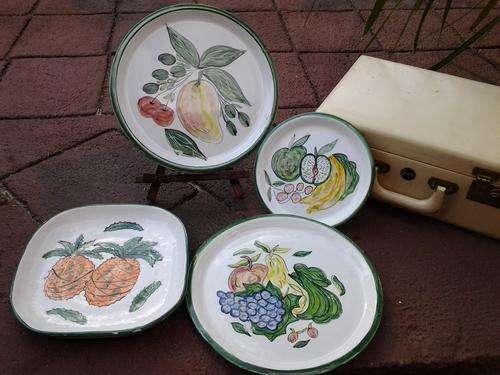 A set of  collective decor hanging plates from "The Potter", lovely designs.