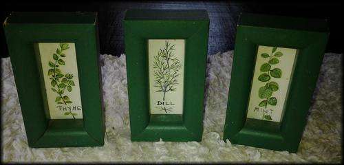 A set of 3 miniture herbs framed in thick ornate frames- a great deal. See photos.