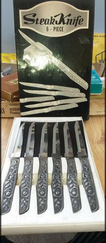 6 Pc Steak knife set- Stainless Steel-In original box- with stunning rose filigree design.