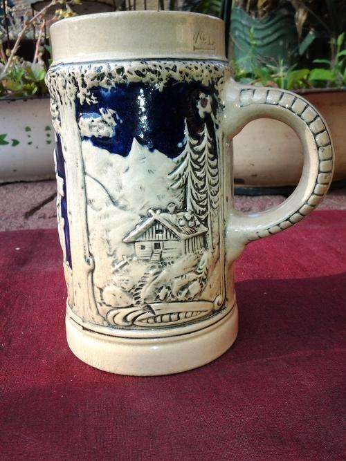 A Stein Beer mug with lots of raised detais & markings - see pics.