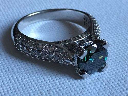 Genuine moissanite ring in solid silver size 7