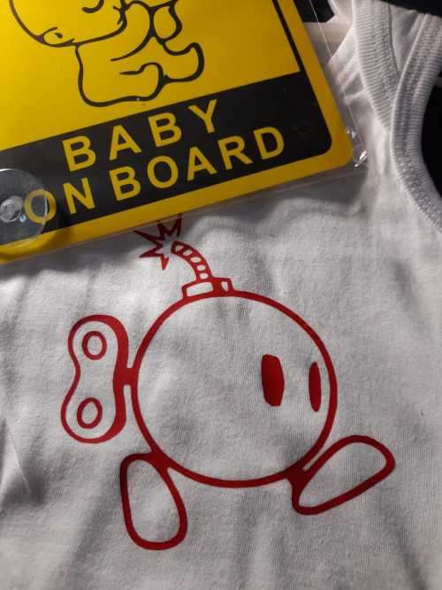 New born baby grow with free baby on board sign